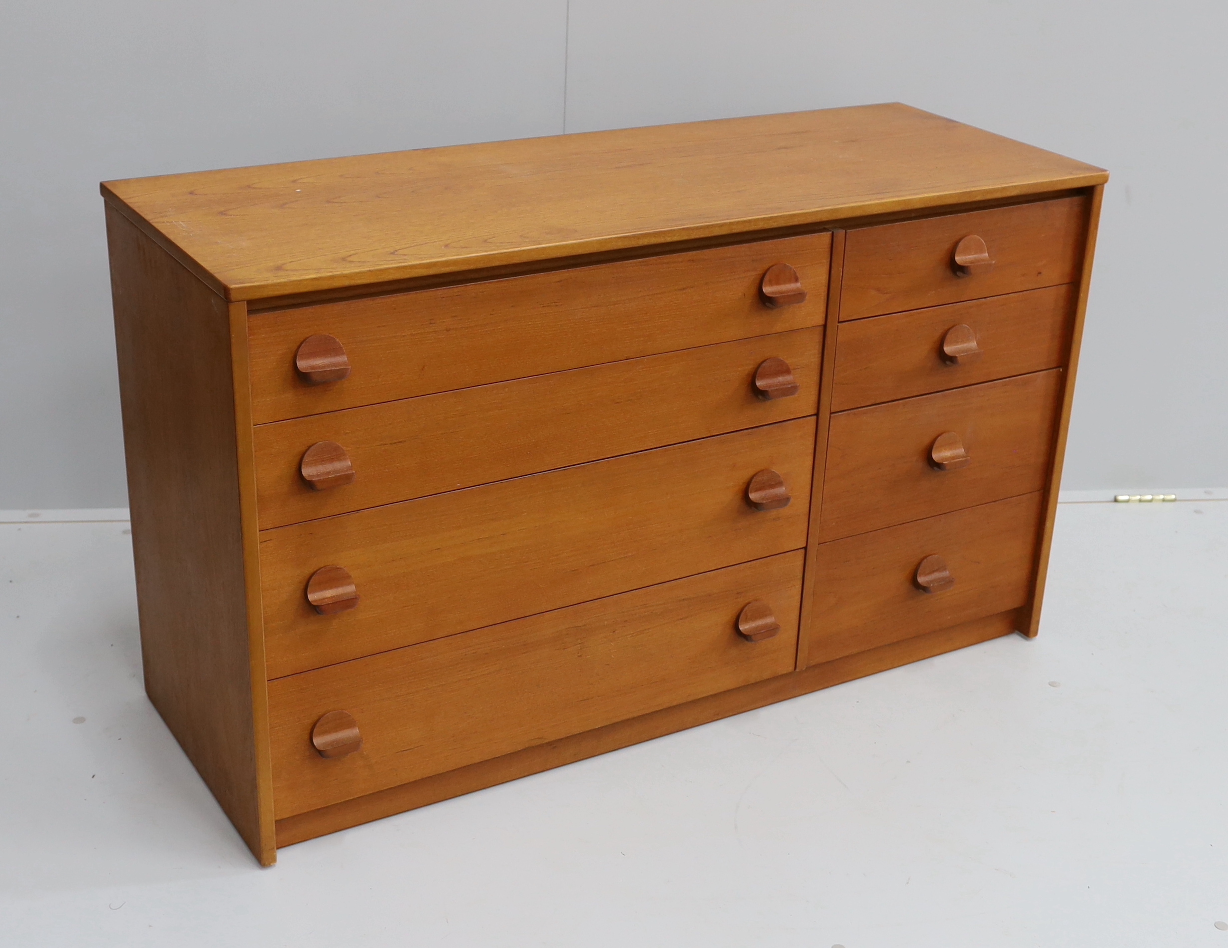 Ron Carter for Stag Furniture - A 'Cantata' teak chest of eight drawers, width 118cm, depth 44cm, height 69cm